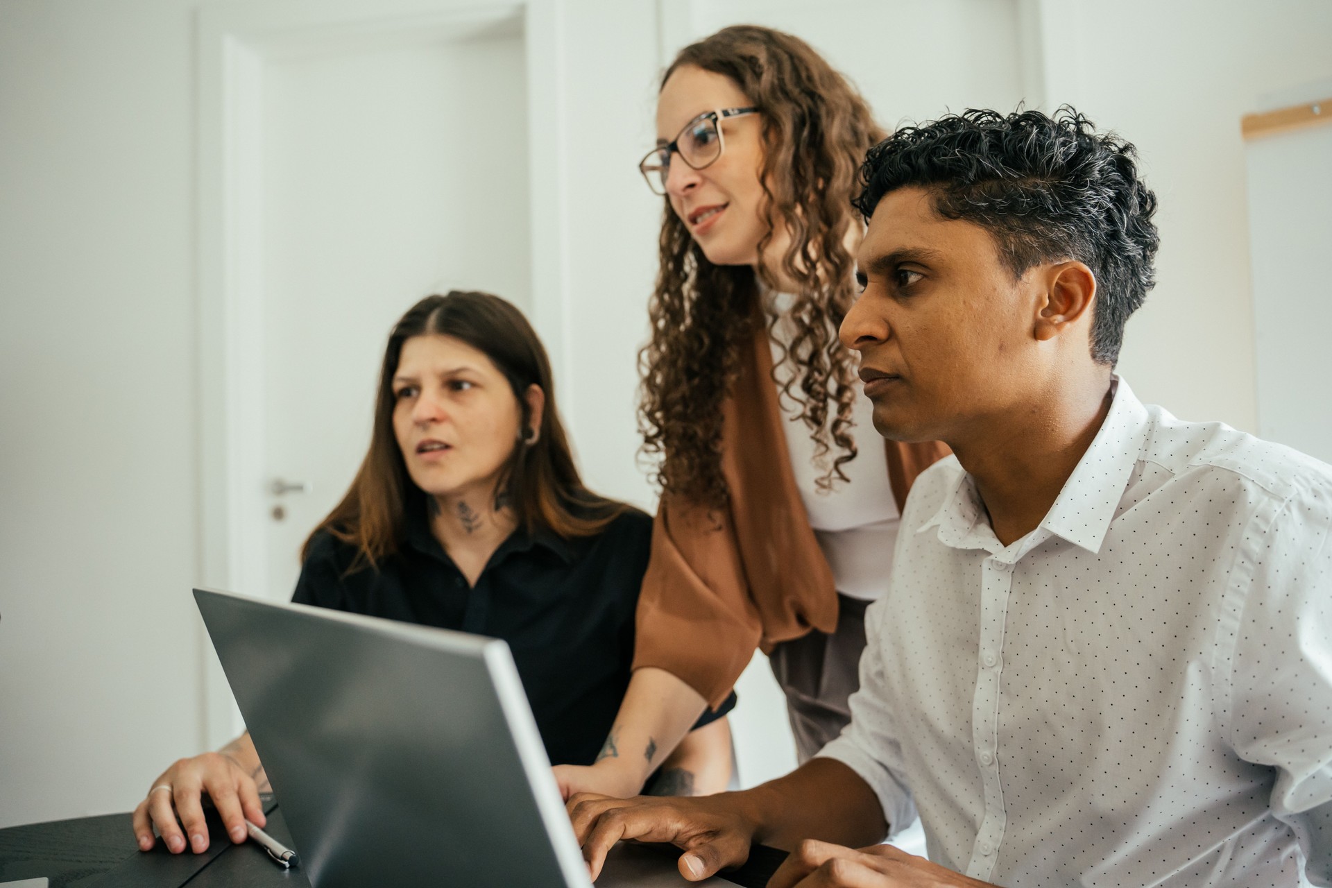 Employees in a project meeting in a modern office